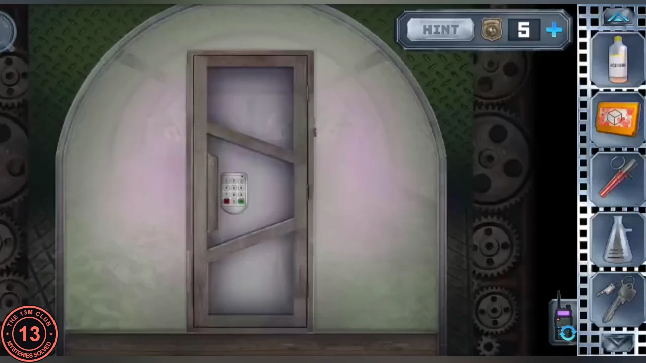 Greenhouse door inside a glass dome in the mechanism room, with a small keypad on the door