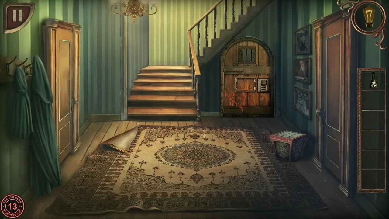 The foyer with the staircase and the iron-banded door under the stairs that carries the Strong Lock.