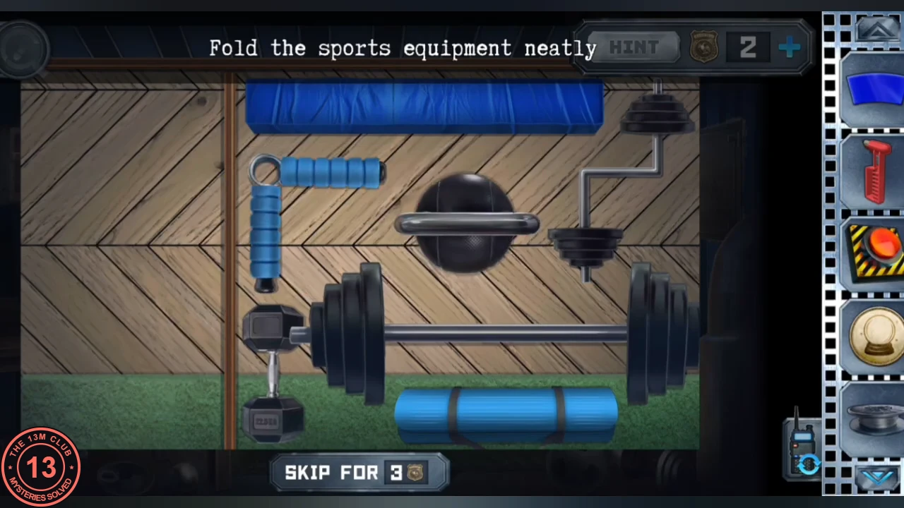 The equipment rack neatly filled: mat along the top, hand grip at left, kettlebell in the middle, dumbbell bar at right, barbell across the bottom with a dumbbell beside it and a rolled mat underneath, no red overlaps