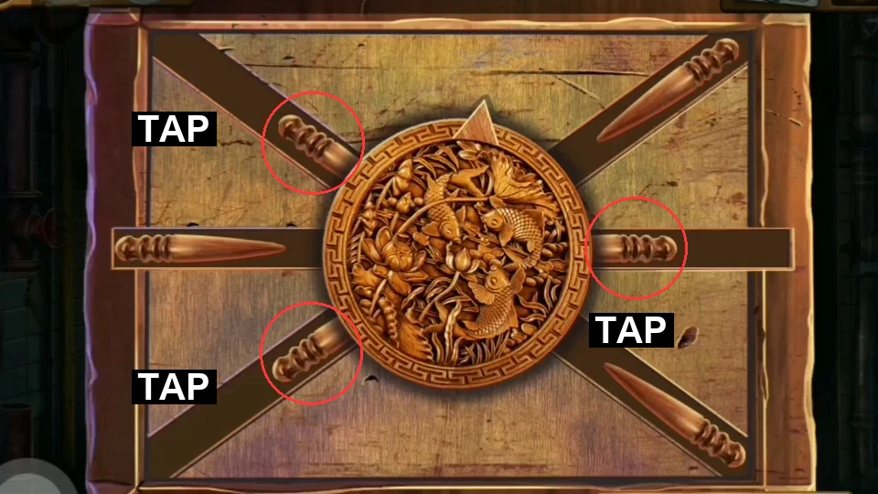Pipe box with six pins around a carved disc; the top-left, right and bottom-left pins show only short knobs and are circled with TAP labels