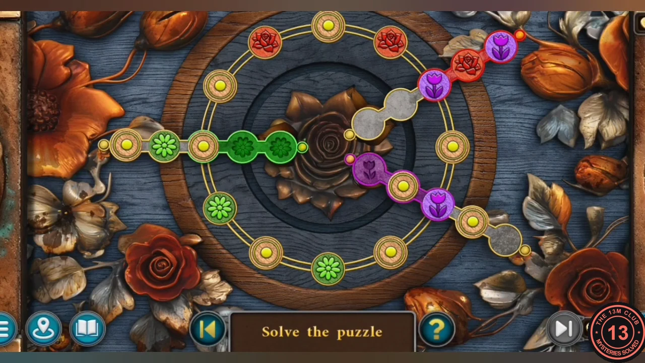 Rose box puzzle: three bead tracks crossing a ring of holes, with green, red and purple flower beads mixed up