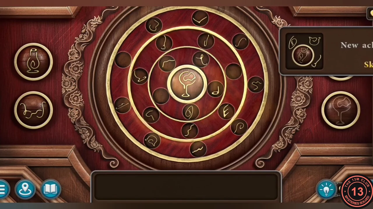 Completed ring puzzle with the lantern, spectacles and goblet pictures in the corner slots and an achievement popup at the upper right